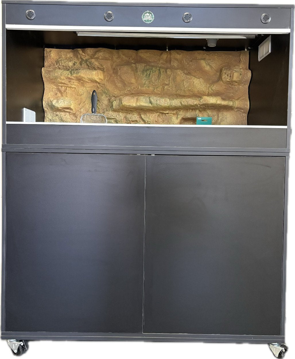 Reptile enclosure available at Sydney Reptiles, designed to provide a safe and comfortable habitat for various reptiles. Ideal for Bearded Dragons, Snakes, Bluetongue Lizards, and Monitor Lizards, this high-quality enclosure offers ample space, proper ventilation, and secure locking systems to meet the needs of your pet. Perfect for creating an environment that supports your reptiles' natural behaviour and health.