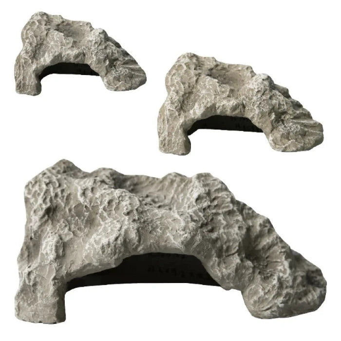 Reptile enclosure decorations available at Sydney Reptiles, designed to enhance your pet’s habitat with realistic and safe decorations. Perfect for Bearded Dragons, Snakes, Bluetongue Lizards, and Monitor Lizards, these decorations create a natural, enriching environment that promotes exploration and hides. Add a touch of the wild to your reptile's home with rocks, plants, logs, and other accessories that provide both visual appeal and functional benefits for your pet's well-being.